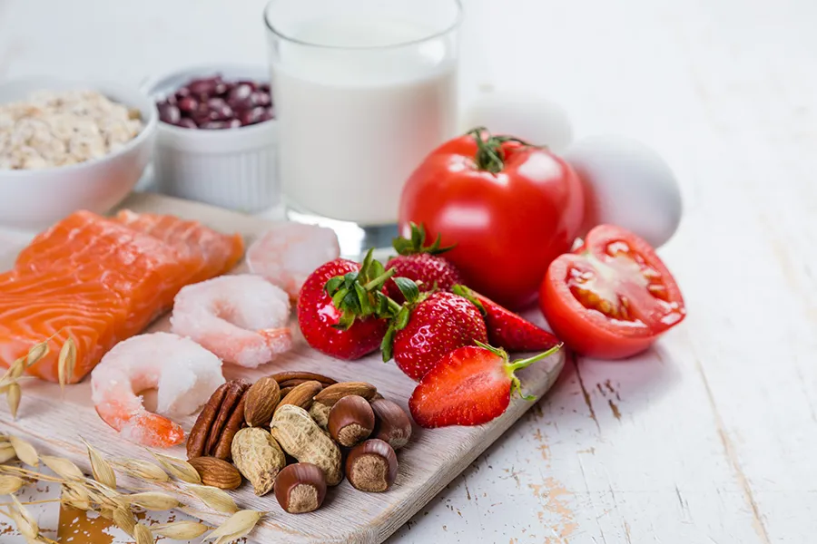 Food-Allergies-Clinic A board of foods like nuts, shellfish, and dairy, that are commonly associated with allergies. Get treatment for food allergies from Better Life Carolinas of Charlotte in Charlotte Metro.