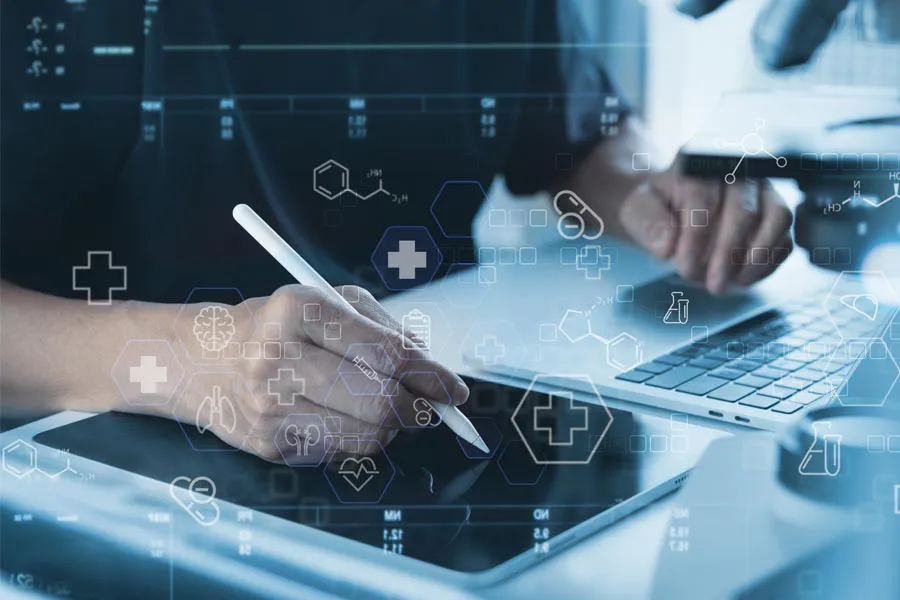 Health-Conditions-Treated-Doctor Close-up of a medical professional using a laptop and tablet, with illustrated medical symbols overlayed on the image, symbolizing health conditions treated by Better Life Carolinas of Charlotte in Charlotte Metro.