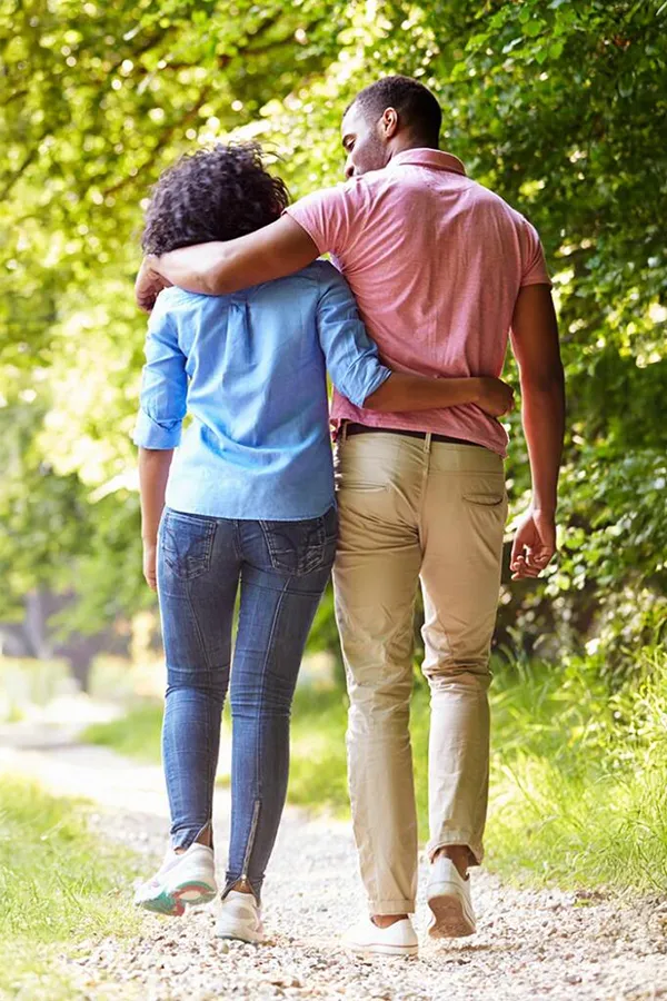 MOTS-c-Peptide-Treatment A healthy black couple take a nice stroll on a trail. Get MOTS-c Peptides for metabolism and weight loss from Better Life Carolinas of Charlotte in Charlotte Metro.